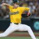 Ginn coquetea otra vez con un no-hitter en paliza de Atléticos vs. Nacionales